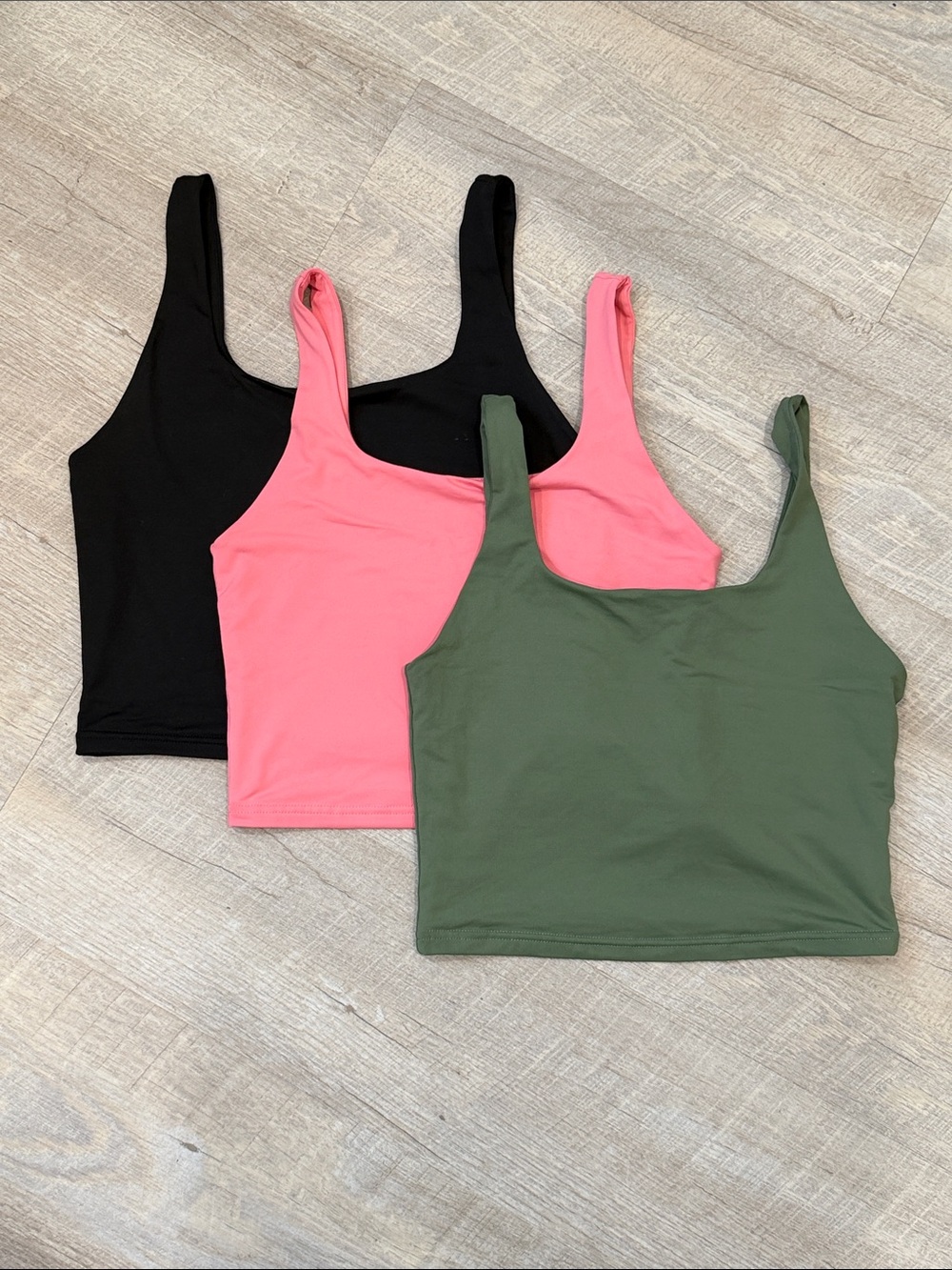 Bundle of ReoRia Crop Tank Trio in Black, Pink & Olive